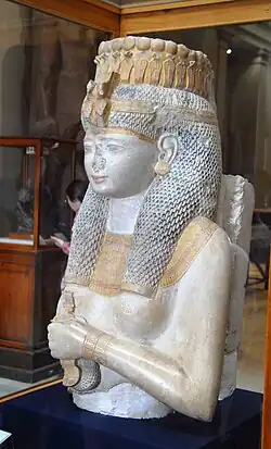 Statue of Meritamen, daughter of Ramesses II, wearing a modius decorated with uraei. From the Ramesseum, 19th Dynasty.