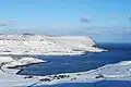 Øravík in snow on 28 February 2010. Froðba is on the other side of Trongisvágsfjørður.