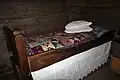 Laced valance on a single bed, Museum of Wooden Architecture, Suzdal, Russia