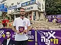 Candidate Kirill Karetnik and posters supporting him