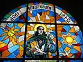 Stained glass at the cathedral facade featuring Nicholas of Tolentino