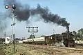 A Japanese-built YD hauling a passenger train, 1993
