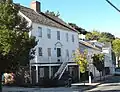 Original Stephen Rowe's tavern and store (1804), 182 Front St., and other houses of the early 19th century oystering village on Front St. north of the Grand Ave. Bridge.