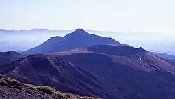 Shinmoedake Volcano (front) and Takachihonomine Volcano