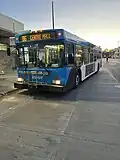 New Flyer D40LF in Saskatoon Transit's default blue scheme, with bike rack, received from New Flyer in 2002.