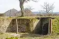 The entrance with the Télots slag heaps in the background.
