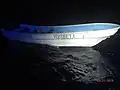 Coast Guard Cutter Escanaba (WMEC-907) interdicted the Yosibell, a 25-foot makeshift boat with 21 migrants on board, in the Mona Passage on May 20, 2019