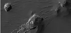 Butte in Arsinoes Chaos with some light-toned layers, as seen by HiRISE under HiWish program