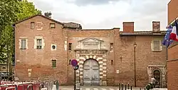Street façade with 19th-century portal.