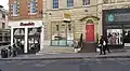 51 Park Street, showing rusticated lower storey, railings, steps and pedimented doorway.