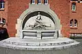 Wall fountain on the facade