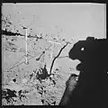 Drive tube, sample 12027, in place in the trench.