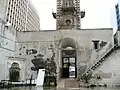 Main gate as seen from inside courtyard facing south; stairs to clock tower on the right