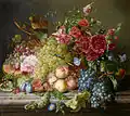 Still life with fruit and flowers on a ledge