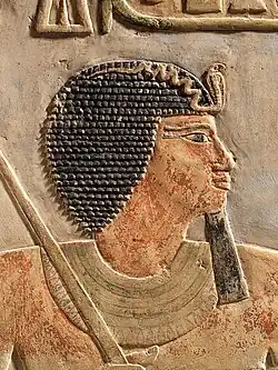 A relief depicting the king and his name in cartouche