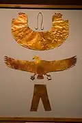 Sheet gold pectoral and other coverings.