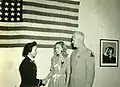 Brigadier General John L. Pierce and his daughter, Isabel, during her swearing-in ceremony for WAVES (Women Accepted for Volunteer Emergency Service).