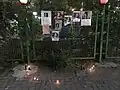 Tributes left on a wall in the Ekbatan district