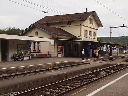 Three-story building on side platform