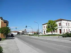 Via Oriano Scavazza and Town Hall in Baruchella.