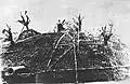 Camouflage netting spread over the gun, 1939