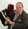 Bertrand Malvaux holding a 1st Regiment of Foot Grenadiers of the Old Guard bearskin (1811 Pattern)