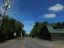 Herkimer County Route 1 southbound at the Big Moose fire station.