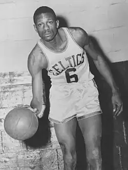 Russell dribbling a basketball