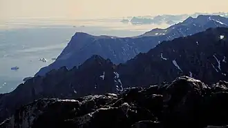 The dramatic Blosseville Coast, looking south from Tuttilik