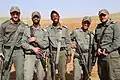 Border police officers wearing Madei Bet.