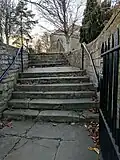 Boundary wall, gate, steps and overthrow