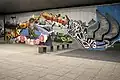Close-up view of a street art on one of the pillars of the Bridge of the SNP in Bratislava (2018).