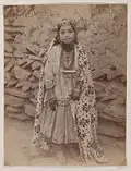 Girl Adorned in Silver Jewelry