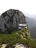 The Tegernsee cabin (German: Tegernseer Hütte) and the Buchstein.
