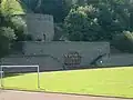 Sports field with sportsmen-relief