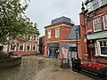 The former location of Burlington Street,[9] which abutted the southern edge of the Old Town Hall, today occupied by part of the Teanlowe Centre