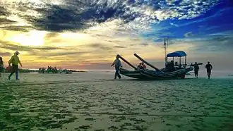 A fishing village at dawn.