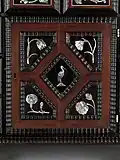 Detail of an engraved mother-of-pearl inlaid table cabinet attributed to Herman Doomer in The Metropolitan, New York, accession number 2011.181.