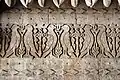 The frieze on the back of the throne
