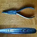 Antique Channellock needle-nose pliers with handle detail, 1930s.