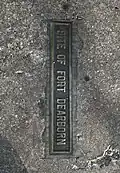 Michigan Ave plaque showing where northern wall of Fort Dearborn was