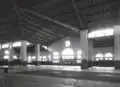Interior of the market, circa 1945,[8] showing the large brick pillars supporting the building, as well as the tiled floor, which had a Greek key border[12]