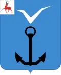 Symbols of the village in the form of a coat of arms