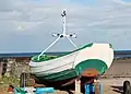 Raked transom with rudder mounting points