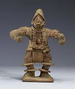 Standing Figure with Elaborate Costume Holding Rattles, 300 BC-AD 300 (Late Pre-Classic), previously in Spratling's collection, now at Walters Art Museum.