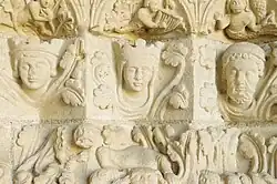 Carved heads (interior).