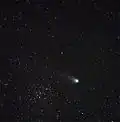 Photo of comet C/2001 Q4 (NEAT) next to Messier 44
