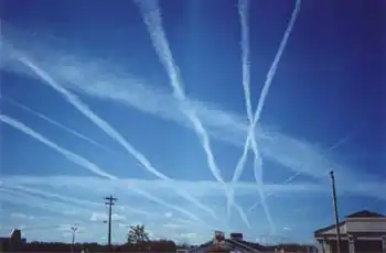 Image 27Water vapor contrails left by high-altitude jet airliners. These may contribute to cirrus cloud formation. (from Aviation)
