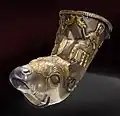 Silver and gold rython