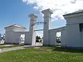 Entrance to the Cypress Grove Cemetery, with gates said to be suggestive of triumphal passage from one world to the next[12]